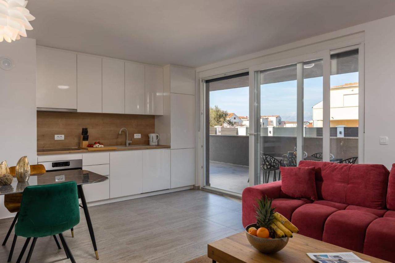 Apartments Cesare Nin Esterno foto