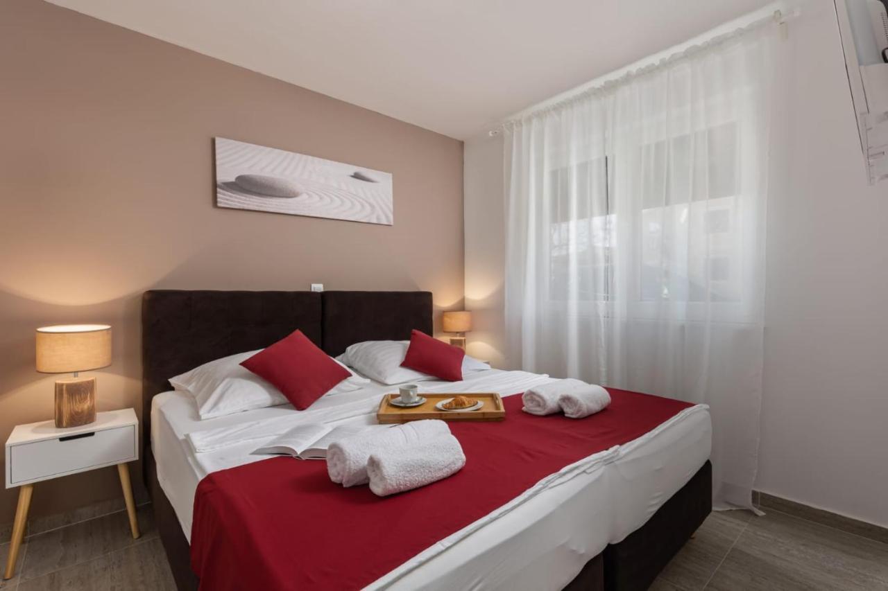 Apartments Cesare Nin Esterno foto