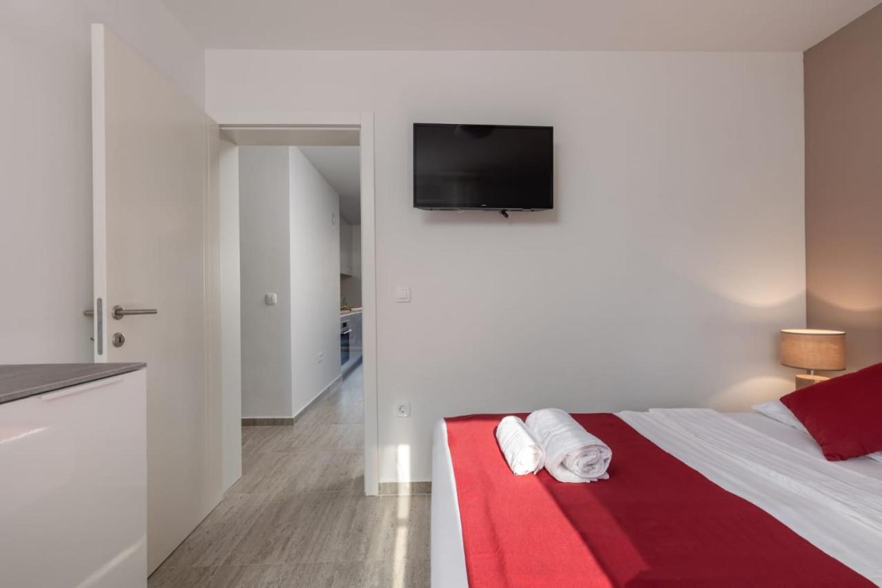 Apartments Cesare Nin Esterno foto